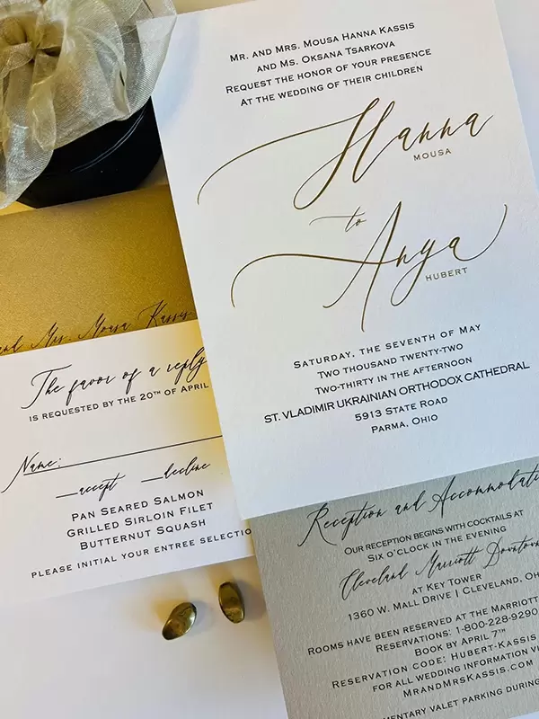 Classic gold foil stamped in cotton stock. Metallic accessory card and envelope.