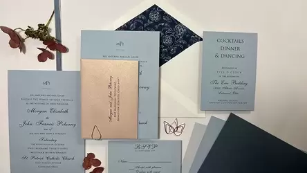 Dusty blue luxury wedding invitation with envelope liner.