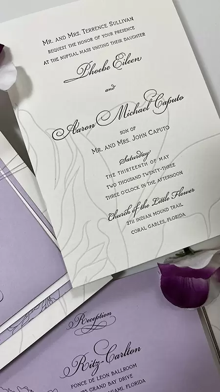 Black, white and purple letterpress with a sting belly band finished with a celtic gold wax seal