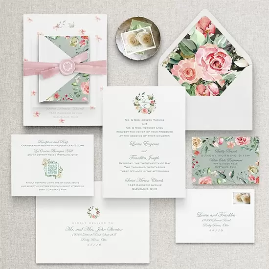 Sage and floral letterpress suite includes shades of pink floral liner, ribbon and wax seal.