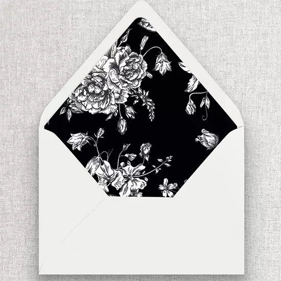 Black and white envelope liner with Victorian rose floral design.