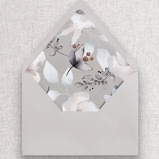 Stone colored envelope with shades of silver and gray branches, berries and leaves.